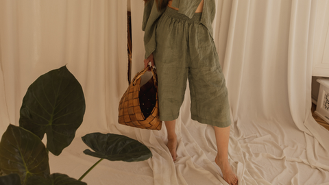 Young attractive woman with a modern designer bag, Elegant woman holding a trendy bag - Rare Klub