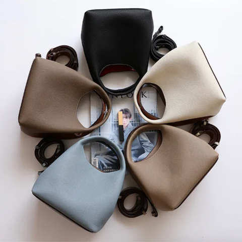 For $79 with free shipping, experience luxury with this versatile two-tone bag, crafted from genuine leather from Rare Klub. Perfect for daily use, travel, and special moments. Enjoy effortless elegance!