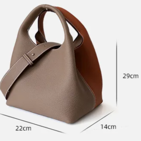 For $79 with free shipping, experience luxury with this versatile two-tone bag, crafted from genuine leather from Rare Klub. Perfect for daily use, travel, and special moments. Enjoy effortless elegance!